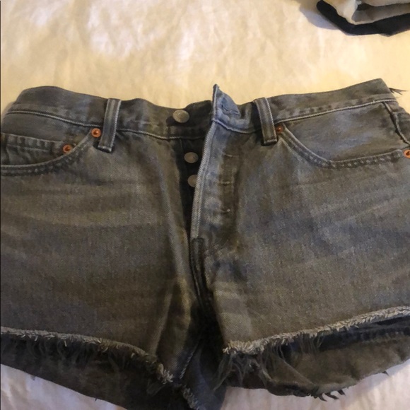 grey ripped jean shorts